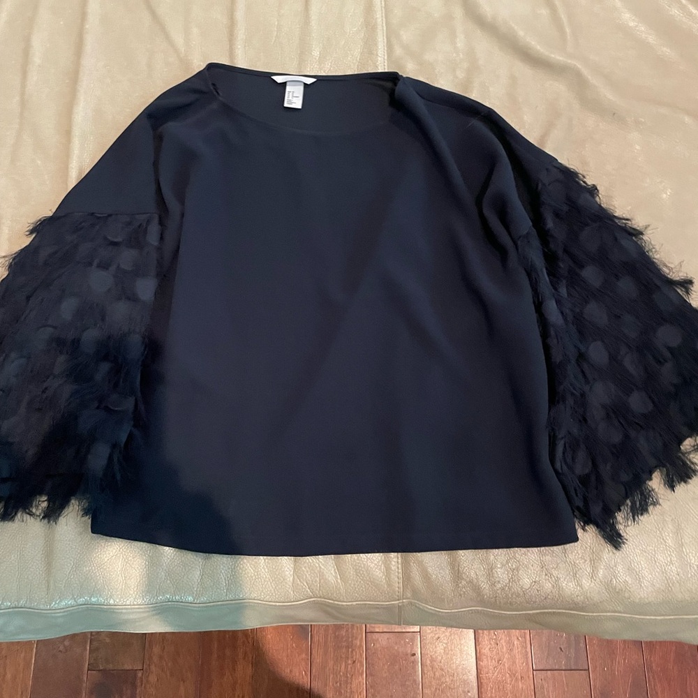 Navy Fun top, wide sleeves with some added accent flare